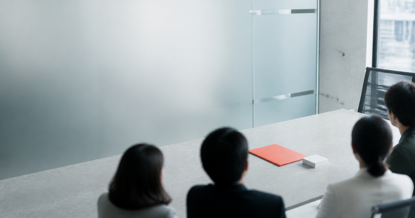 A leadership group choosing one audience from a working table